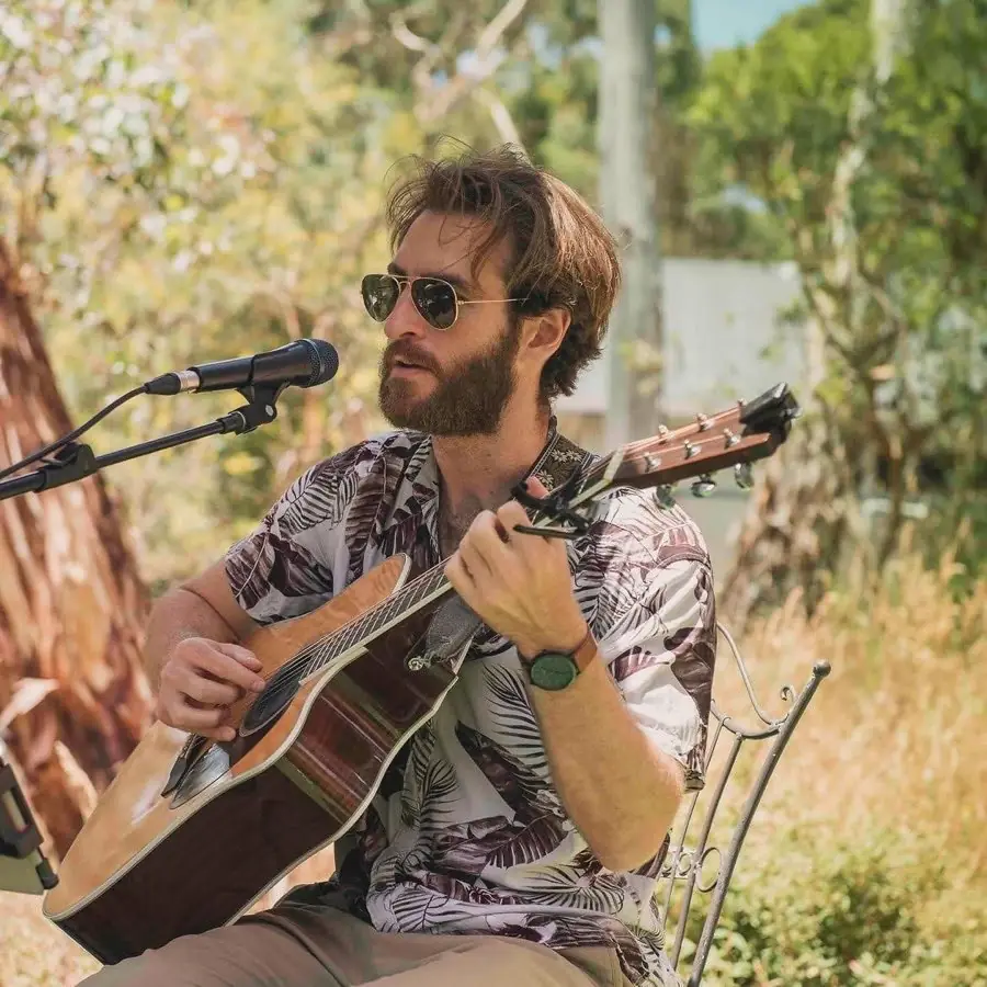A musician playing at the winery
